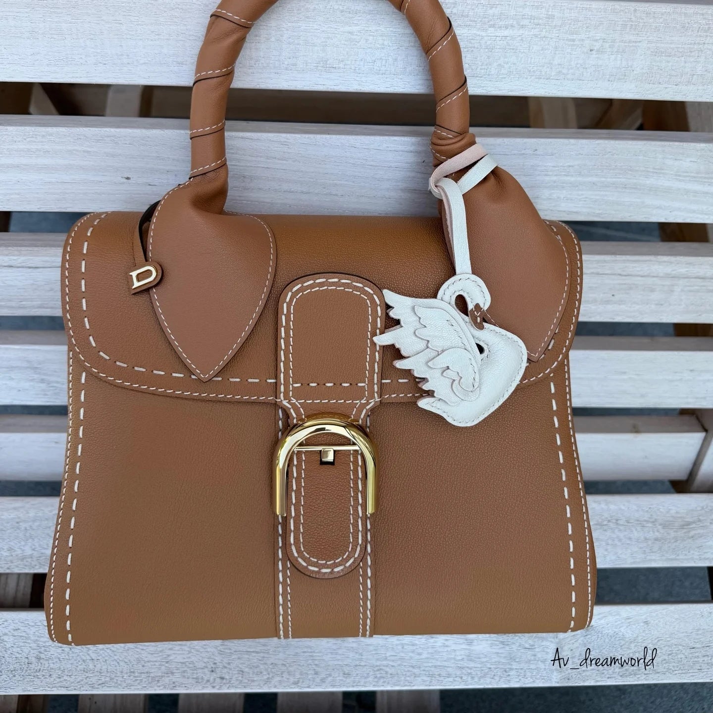 The Swan Charm in Alran Goatskin